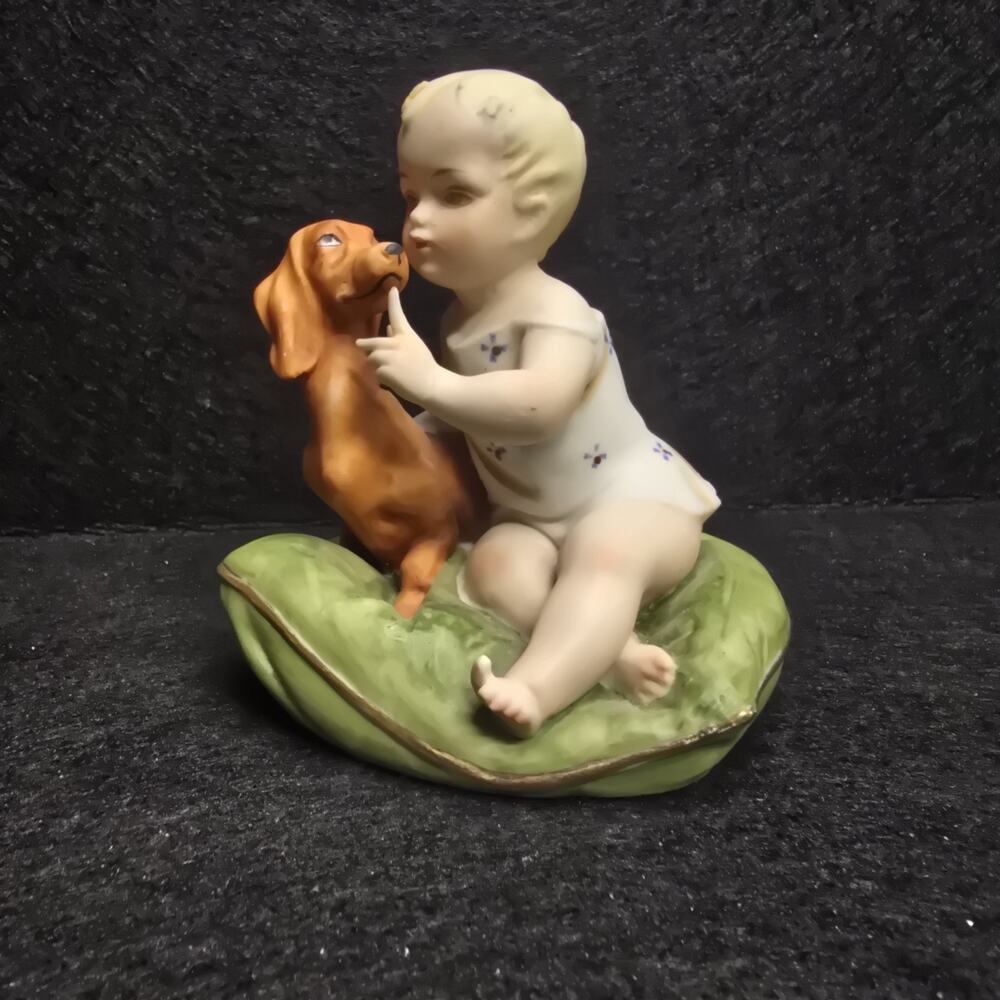 Andrea by Sadek Child with Dachshund Dog on Pillow Porcelain Figurine - Japan